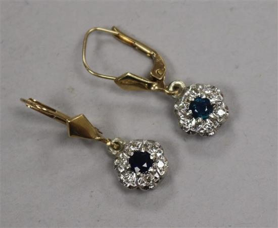 A pair of 9ct gold, sapphire and diamond cluster earrings.